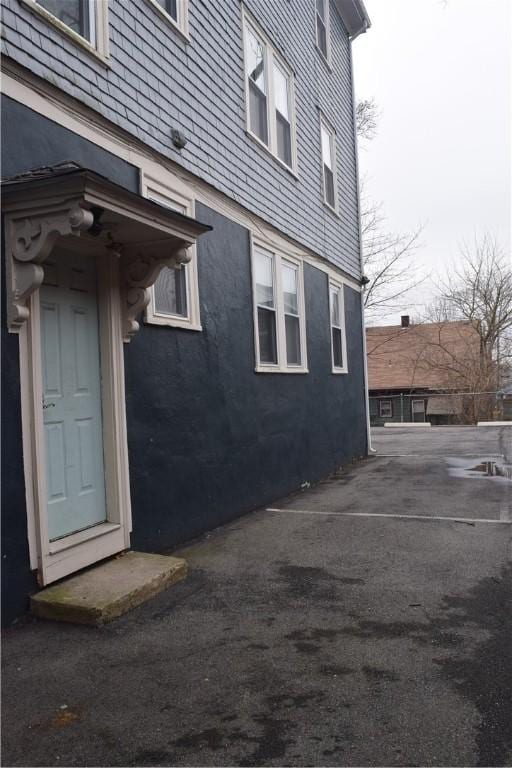 186 Camp St Unit 5, Providence, RI 02906 - view of side of property with stucco siding