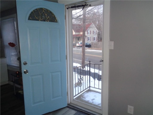 foyer entrance featuring a residential view