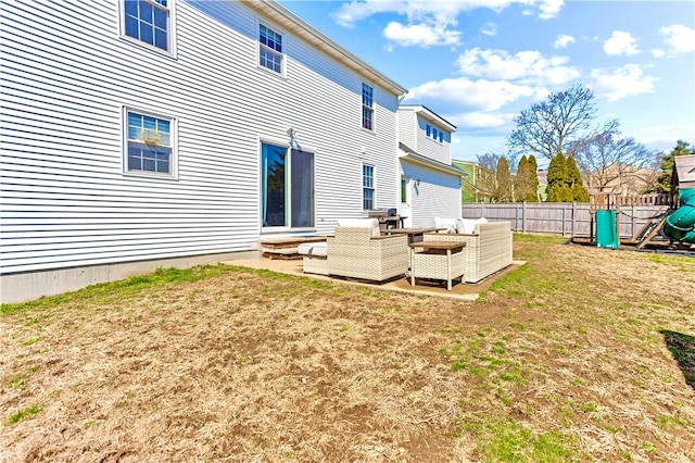 back of property featuring a playground, fence, and a yard