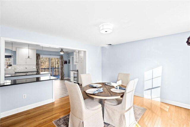 5 Nottingham Way, Freetown, MA 02702 - dining room featuring light wood finished floors, baseboards, and a ceiling fan
