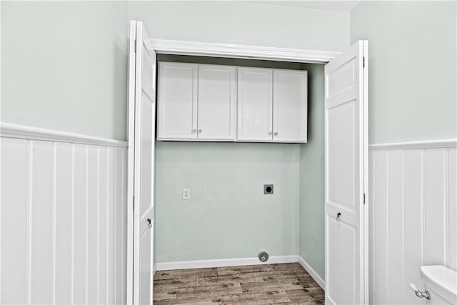 5 Nottingham Way, Freetown, MA 02702 - laundry room featuring hookup for an electric dryer, cabinet space, wood finished floors, and wainscoting
