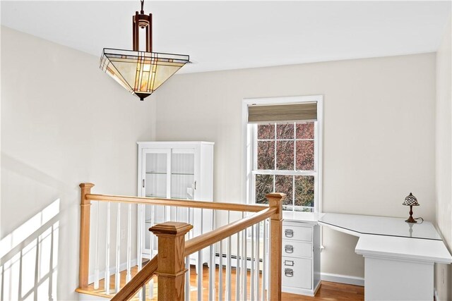 5 Nottingham Way, Freetown, MA 02702 - corridor with an upstairs landing, wood finished floors, and baseboard heating