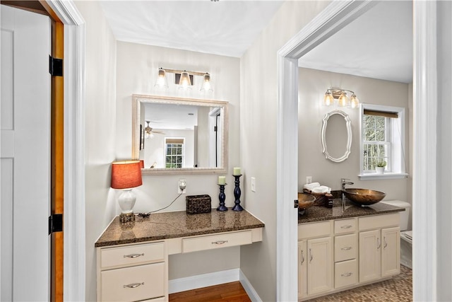 5 Nottingham Way, Freetown, MA 02702 - bathroom with plenty of natural light, vanity, toilet, and ceiling fan