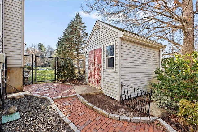 5 Nottingham Way, Freetown, MA 02702 - view of shed featuring a gate and fence