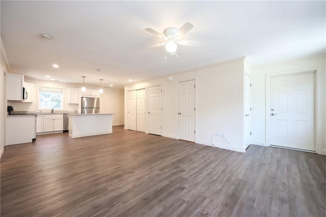 60 Bay Spring Ave Unit A5, Barrington, RI 02806 - unfurnished living room featuring ceiling fan, dark wood-style floors, recessed lighting, baseboards, and a sink