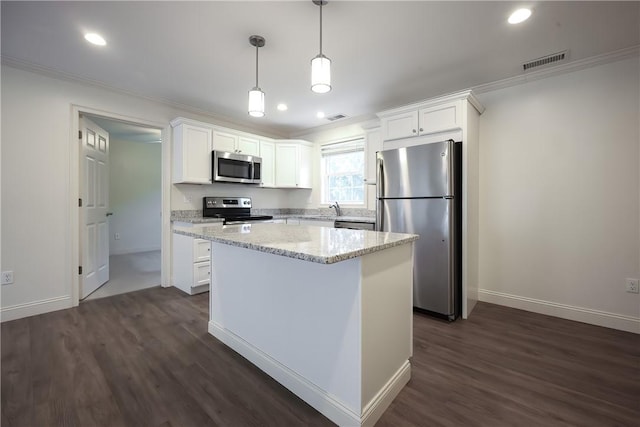 60 Bay Spring Ave Unit A5, Barrington, RI 02806 - kitchen featuring stainless steel appliances, ornamental molding, a sink, dark wood-style floors, and baseboards