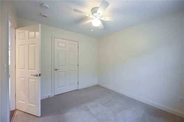 60 Bay Spring Ave Unit A5, Barrington, RI 02806 - unfurnished bedroom featuring carpet flooring, baseboards, and a ceiling fan