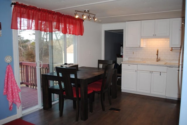 18 Torch Ln, Coventry, RI 02816 - dining room featuring dark wood-style flooring