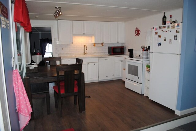 18 Torch Ln, Coventry, RI 02816 - kitchen featuring white appliances, a sink, light countertops, white cabinetry, and dark wood finished floors