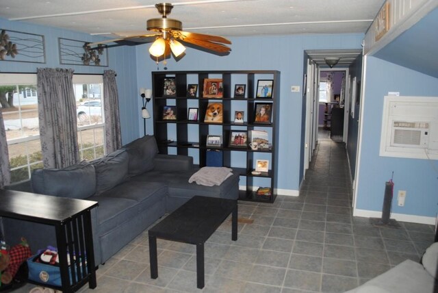 18 Torch Ln, Coventry, RI 02816 - tiled living area with ceiling fan, plenty of natural light, and baseboards