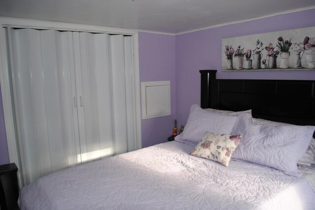18 Torch Ln, Coventry, RI 02816 - bedroom featuring ornamental molding and a closet