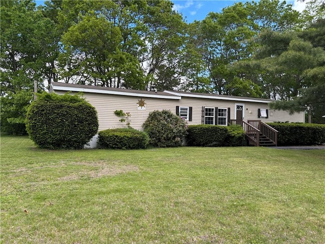 18 Torch Ln, Coventry, RI 02816 - view of front facade featuring a front lawn