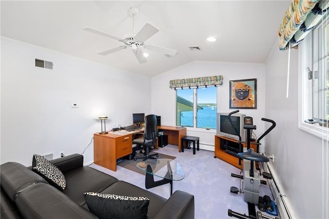 office featuring visible vents, ceiling fan, vaulted ceiling, and carpet floors