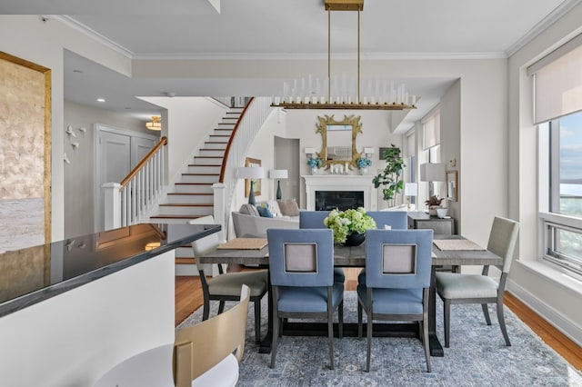 1 Tower Dr Unit 1203, Portsmouth, RI 02871 - dining area featuring stairs, crown molding, and wood finished floors