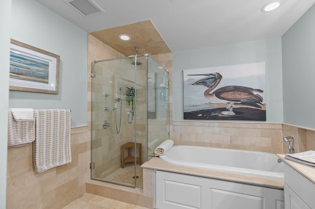 1 Tower Dr Unit 1203, Portsmouth, RI 02871 - bathroom featuring recessed lighting, a stall shower, a garden tub, and visible vents