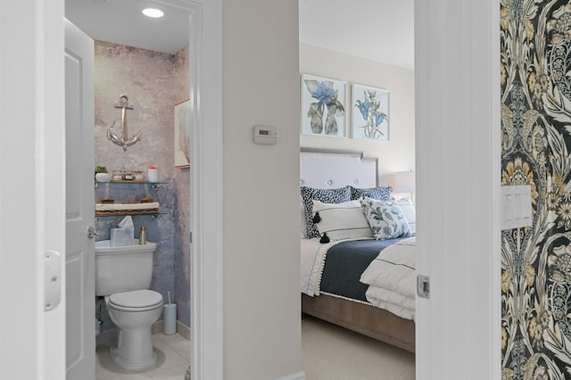 1 Tower Dr Unit 1203, Portsmouth, RI 02871 - ensuite bathroom with baseboards, wallpapered walls, toilet, ensuite bath, and tile patterned flooring
