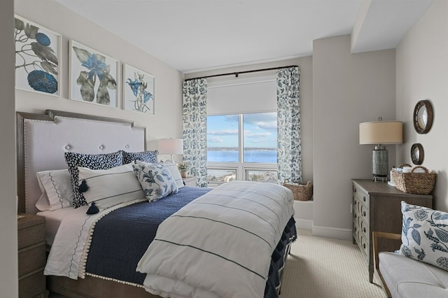 1 Tower Dr Unit 1203, Portsmouth, RI 02871 - bedroom with carpet flooring, a water view, and baseboards