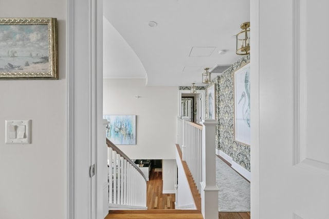 1 Tower Dr Unit 1203, Portsmouth, RI 02871 - stairway featuring attic access, baseboards, and wood finished floors