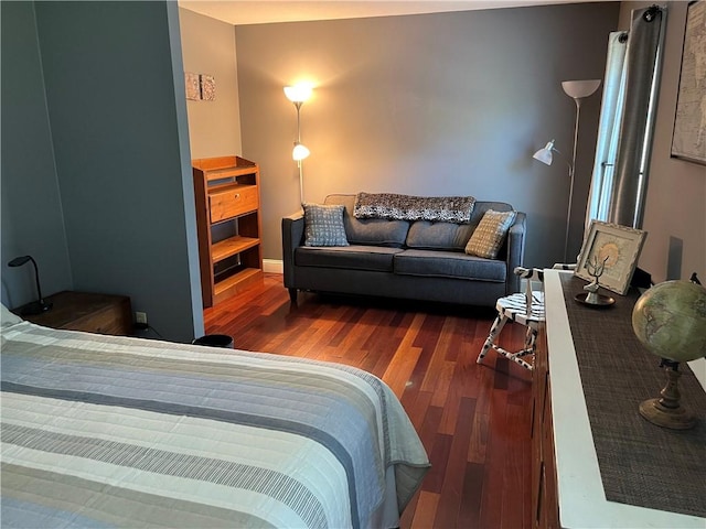 bedroom featuring wood finished floors