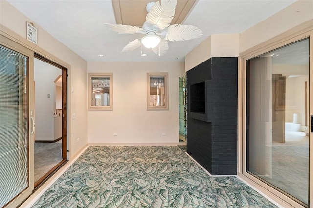 interior space featuring baseboards and carpet flooring