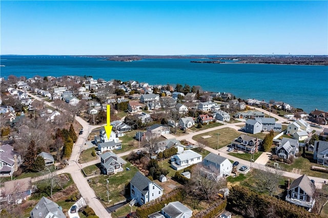 aerial view with a residential view and a water view