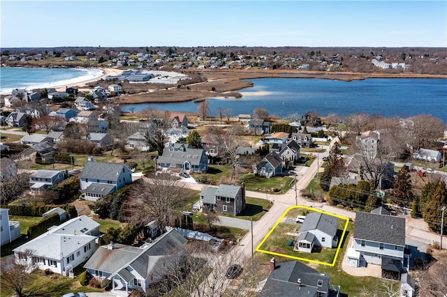 bird's eye view featuring a residential view and a water view