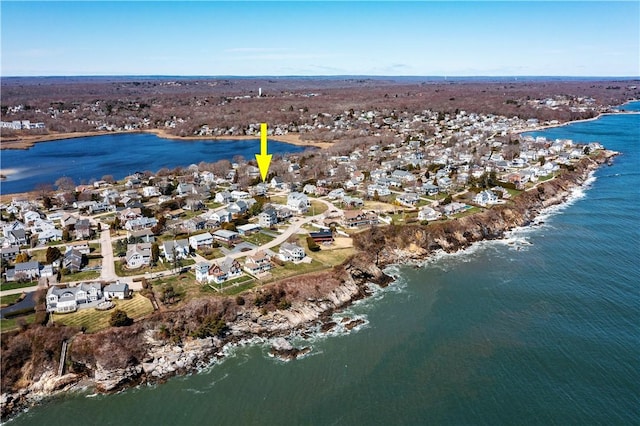 bird's eye view featuring a residential view and a water view
