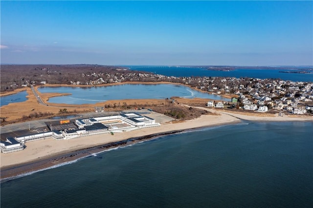 aerial view featuring a water view and a beach view