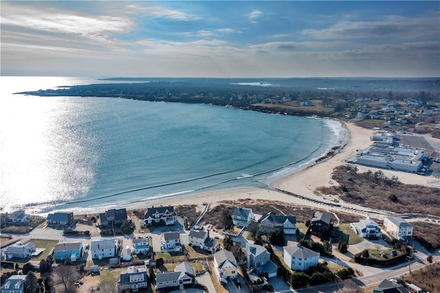 bird's eye view with a beach view and a water view