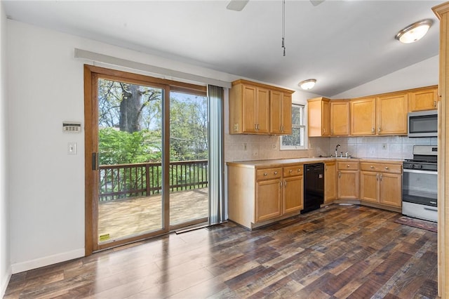 kitchen featuring light countertops, stainless steel appliances, dark wood-style floors, and backsplash
