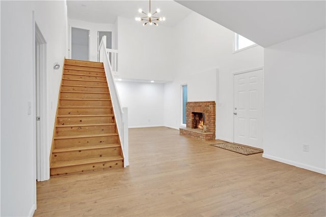 20 Holly Hill Ct, East Greenwich, RI 02818 - interior space with baseboards, wood finished floors, and a notable chandelier