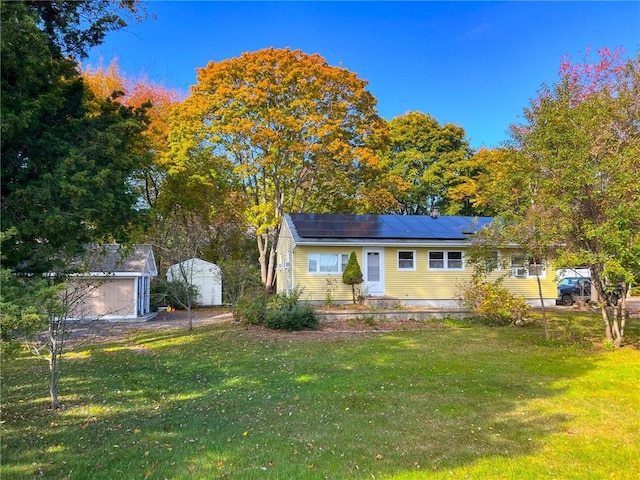 1737 Wampanoag Trl, Barrington, RI 02806 - view of front facade with solar panels and a front lawn