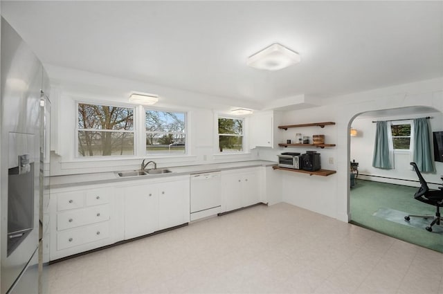 1737 Wampanoag Trl, Barrington, RI 02806 - kitchen with white dishwasher, a sink, light countertops, and healthy amount of natural light
