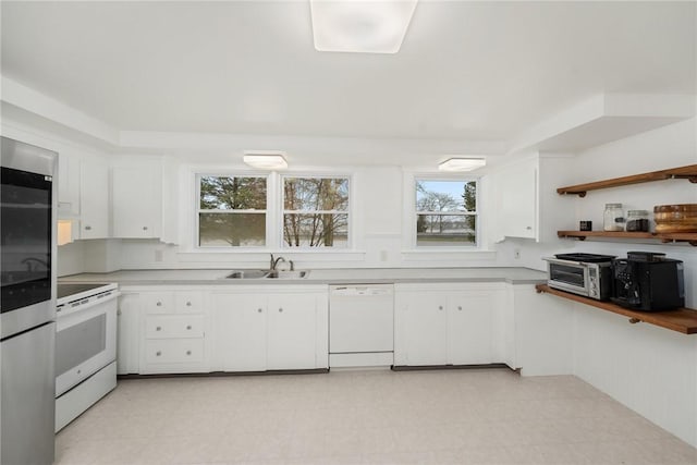1737 Wampanoag Trl, Barrington, RI 02806 - kitchen featuring white appliances, a sink, and light countertops