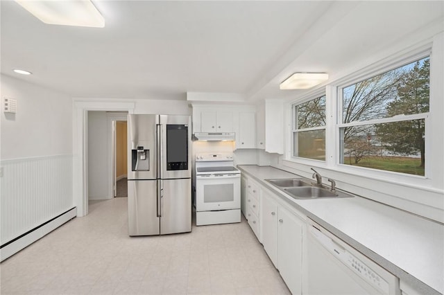 1737 Wampanoag Trl, Barrington, RI 02806 - kitchen with white appliances, under cabinet range hood, a sink, a baseboard heating unit, and white cabinets