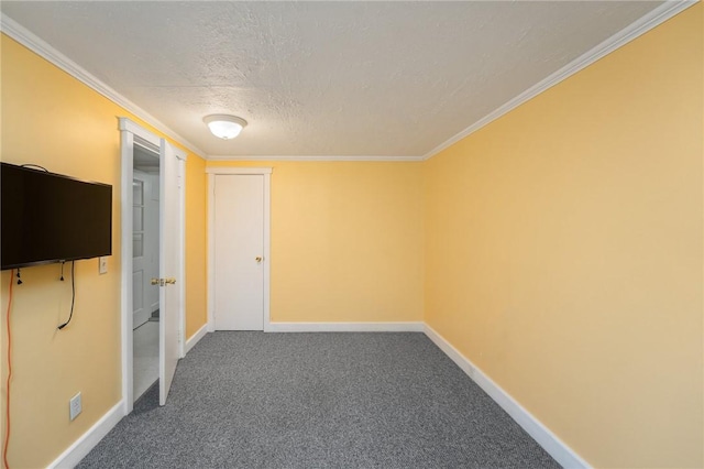 1737 Wampanoag Trl, Barrington, RI 02806 - unfurnished bedroom featuring carpet flooring, a textured ceiling, crown molding, and baseboards