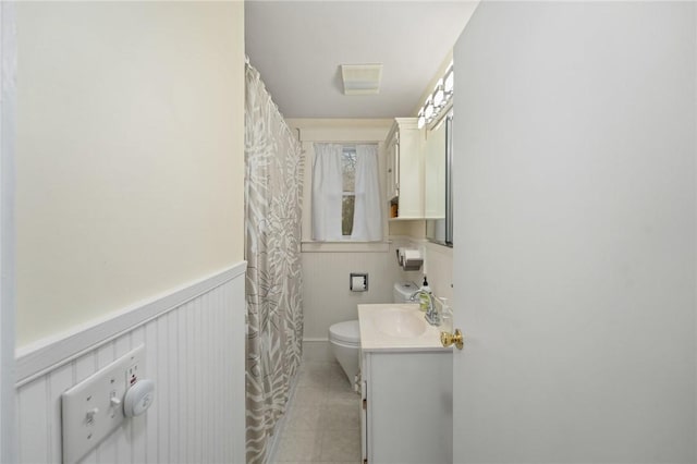1737 Wampanoag Trl, Barrington, RI 02806 - full bath with vanity, toilet, tile patterned flooring, and a shower with curtain