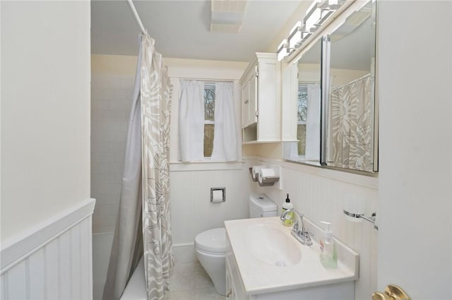 1737 Wampanoag Trl, Barrington, RI 02806 - bathroom featuring toilet, shower / bath combo, tile patterned floors, and vanity