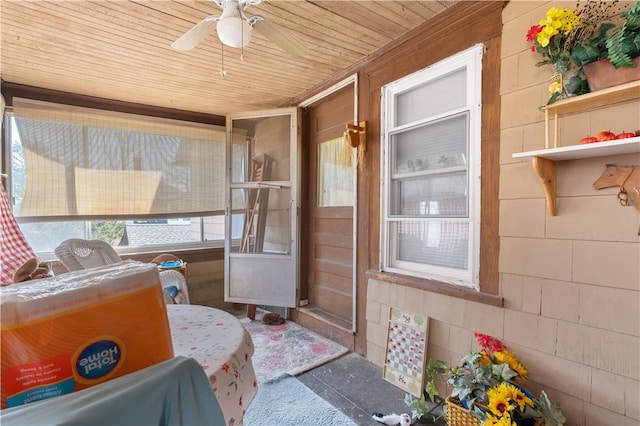 sunroom / solarium with ceiling fan