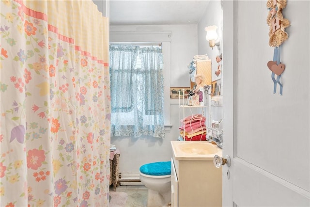 full bathroom with baseboard heating, curtained shower, toilet, and vanity