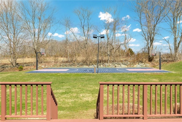 view of yard featuring community basketball court