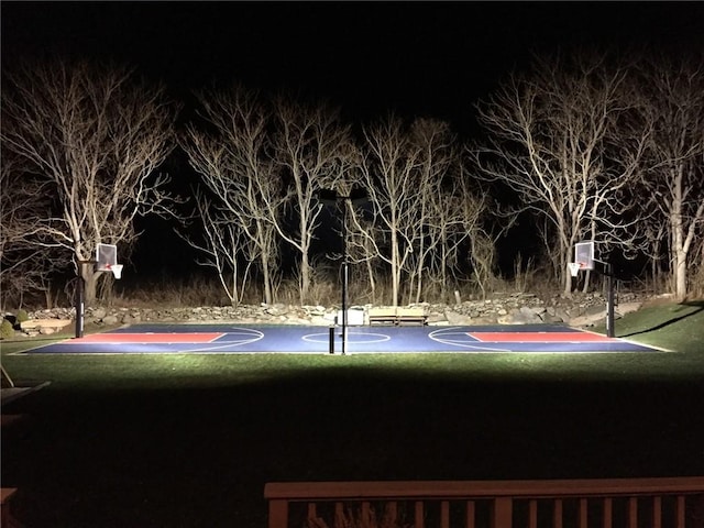 view of sport court featuring a yard and community basketball court