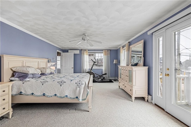 bedroom featuring a ceiling fan, access to exterior, light colored carpet, and crown molding