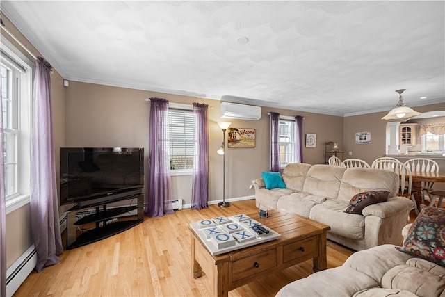 living area featuring baseboard heating, an AC wall unit, baseboards, and plenty of natural light
