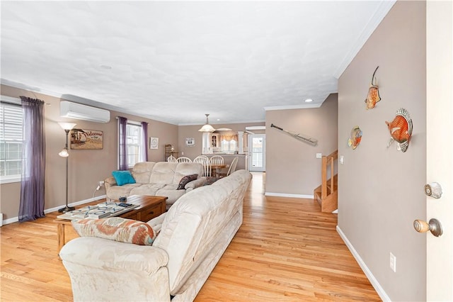 16 Elm Ave, Narragansett, RI 02882 - living area with ornamental molding, plenty of natural light, light wood-style flooring, and baseboards