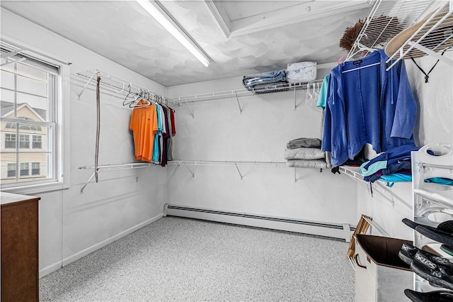 walk in closet featuring a baseboard radiator
