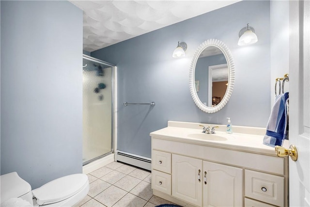 bathroom with a shower stall, a baseboard heating unit, vanity, toilet, and tile patterned flooring