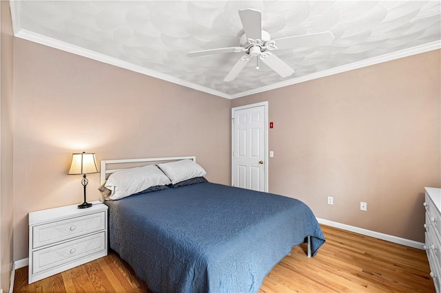 16 Elm Ave, Narragansett, RI 02882 - bedroom with light wood-type flooring, baseboards, a ceiling fan, and ornamental molding