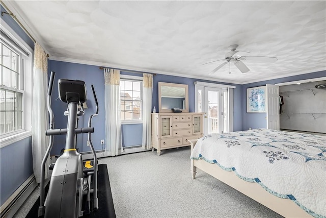 bedroom with carpet, access to exterior, ornamental molding, a baseboard heating unit, and ceiling fan