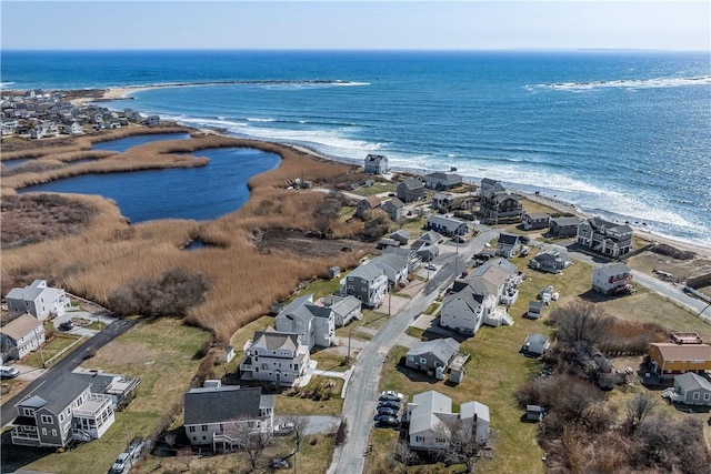 birds eye view of property with a residential view and a water view